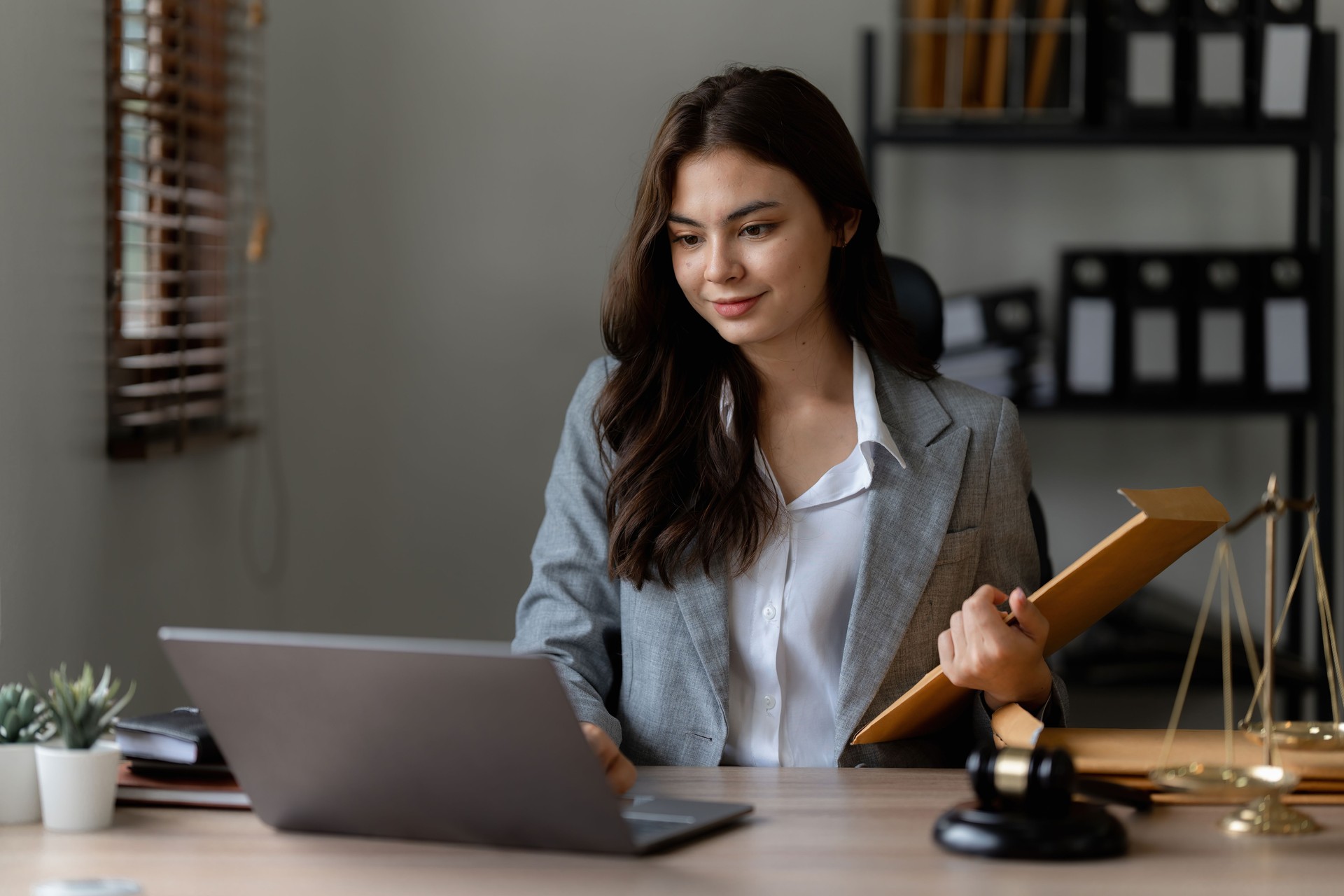 Lawyer business woman working or reading agreement contract in office workplace for consultant lawyer concept